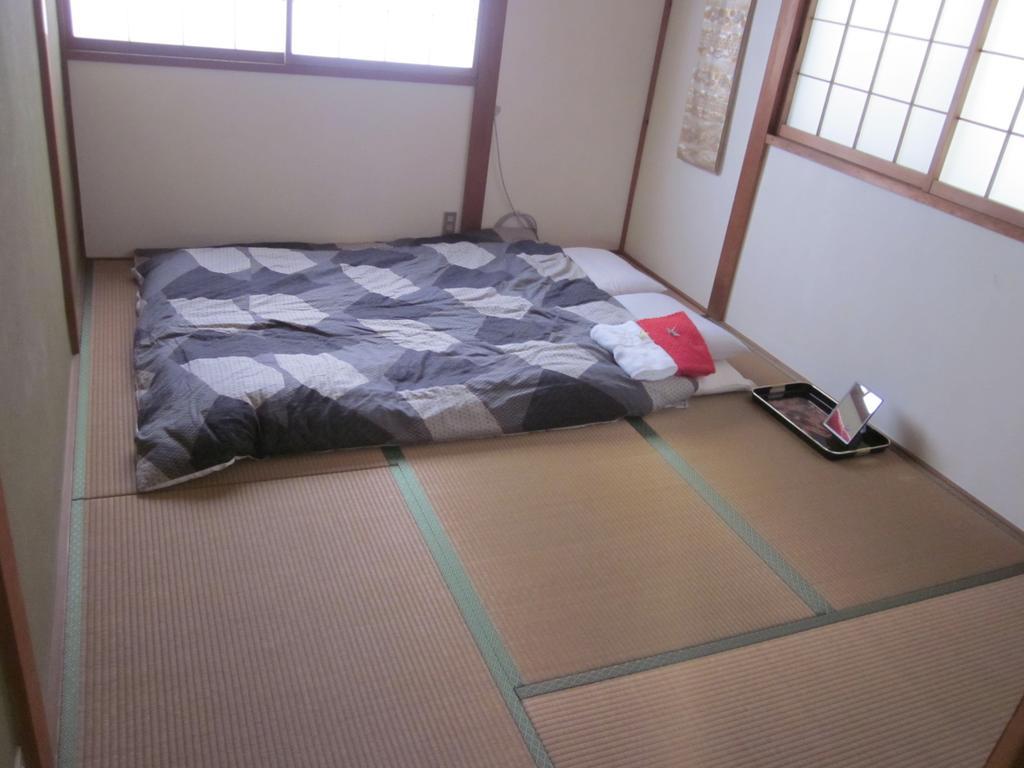 Enman Guest House Osaka Moriguchi Екстер'єр фото