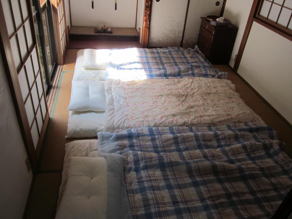 Enman Guest House Osaka Moriguchi Екстер'єр фото