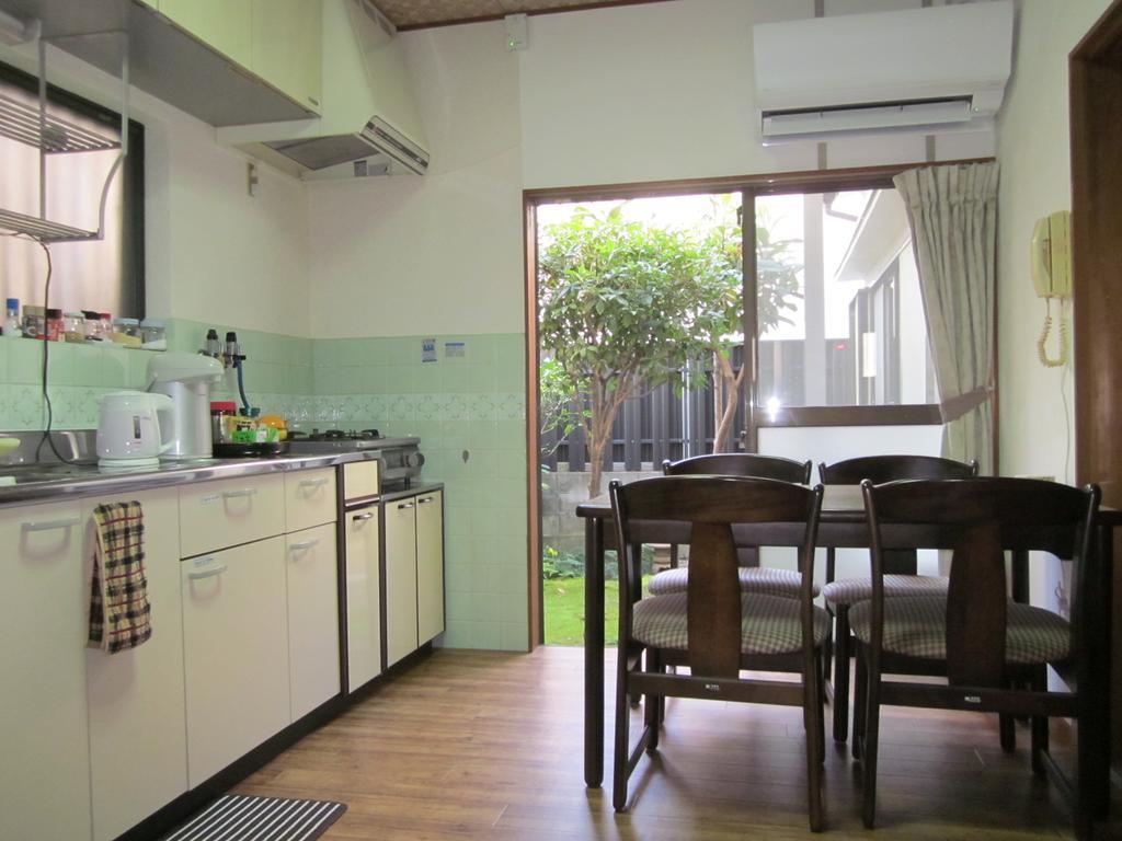 Enman Guest House Osaka Moriguchi Екстер'єр фото
