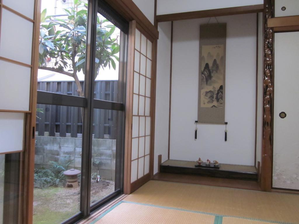 Enman Guest House Osaka Moriguchi Екстер'єр фото