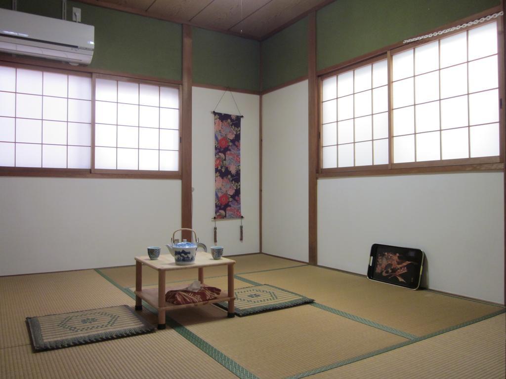 Enman Guest House Osaka Moriguchi Екстер'єр фото